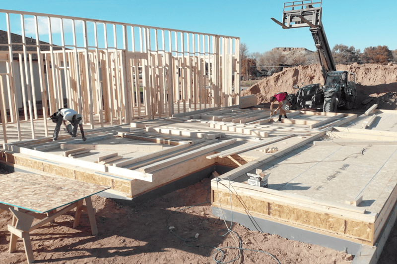 Video - HVAC Equipment for Your New Home. Image is a photograph of a new home foundation being built on a clear day.